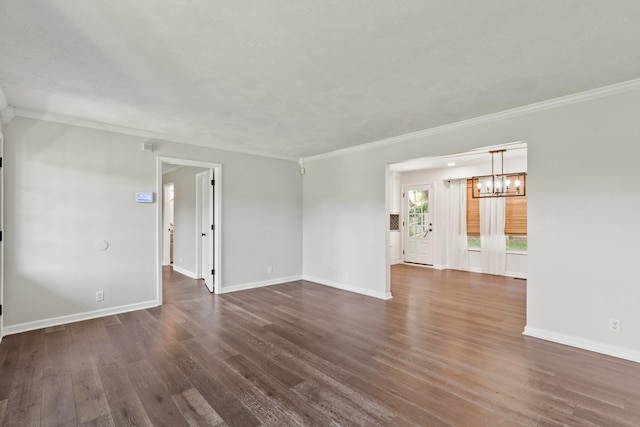 8205 Brownstone Ext, Cross Plains, TN 37049 - unfurnished room with a chandelier, dark wood-type flooring, and ornamental molding