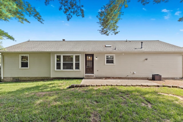 8205 Brownstone Ext, Cross Plains, TN 37049 - back of house featuring a lawn and a shingled roof