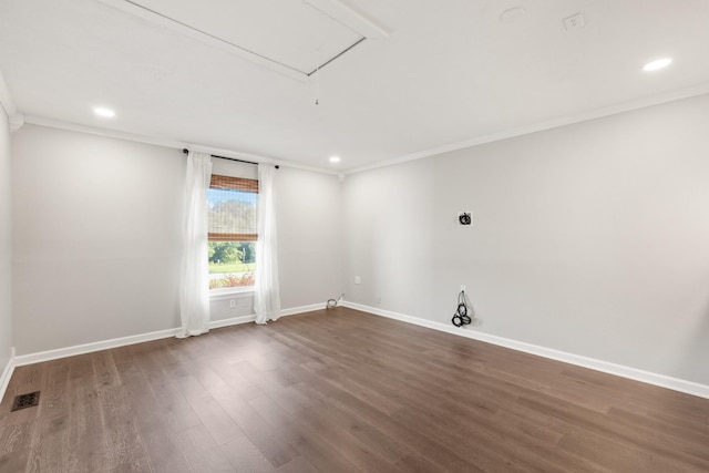 8205 Brownstone Ext, Cross Plains, TN 37049 - empty room with ornamental molding, dark wood finished floors, recessed lighting, and attic access