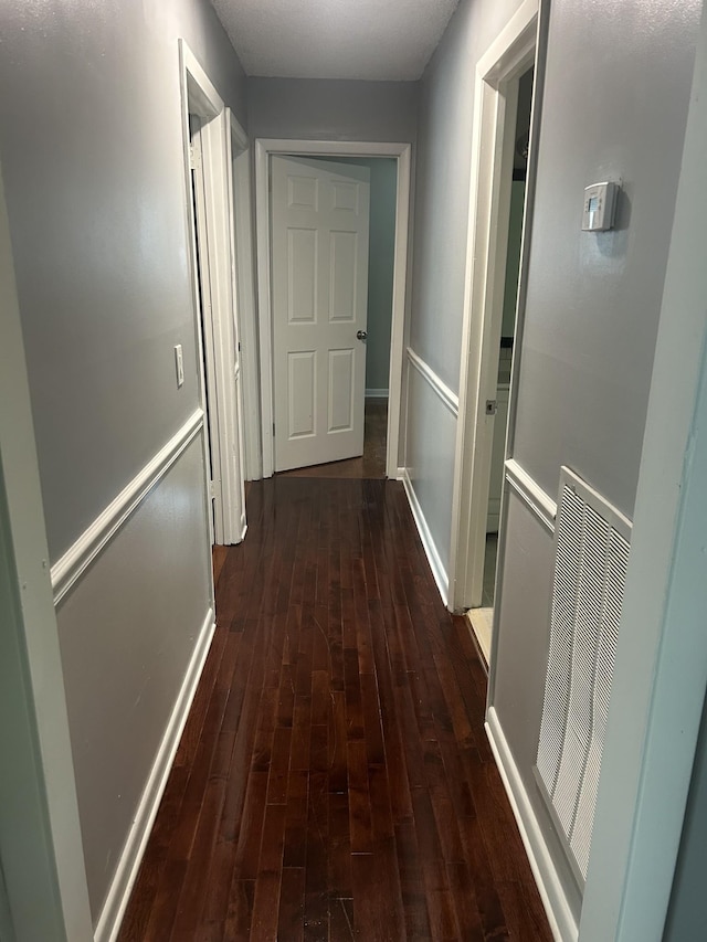 716 Muskhogean Ct, Antioch, TN 37013 - corridor with dark wood-type flooring and baseboards