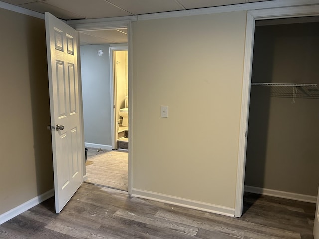 716 Muskhogean Ct, Antioch, TN 37013 - unfurnished bedroom featuring a closet and dark wood-style floors