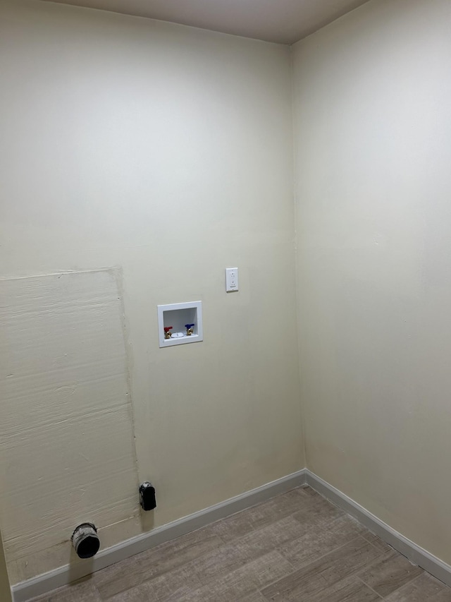 716 Muskhogean Ct, Antioch, TN 37013 - laundry area featuring washer hookup and wood finished floors