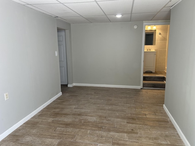 716 Muskhogean Ct, Antioch, TN 37013 - spare room with a drop ceiling and wood finished floors