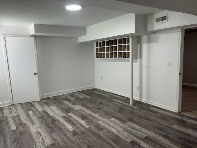 716 Muskhogean Ct, Antioch, TN 37013 - finished basement with dark wood-style flooring and baseboards