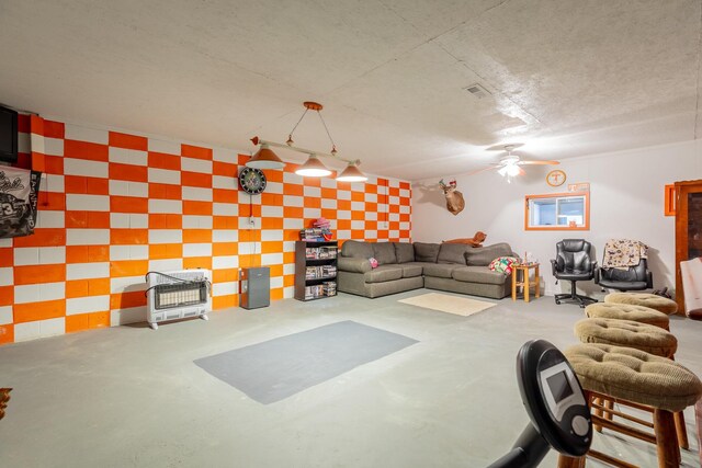 78 Gray Rd, Signal Mountain, TN 37377 - living room with ceiling fan, an accent wall, and wallpapered walls
