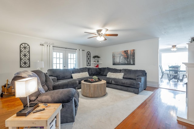 78 Gray Rd, Signal Mountain, TN 37377 - living area with a ceiling fan, plenty of natural light, wood finished floors, and ornamental molding