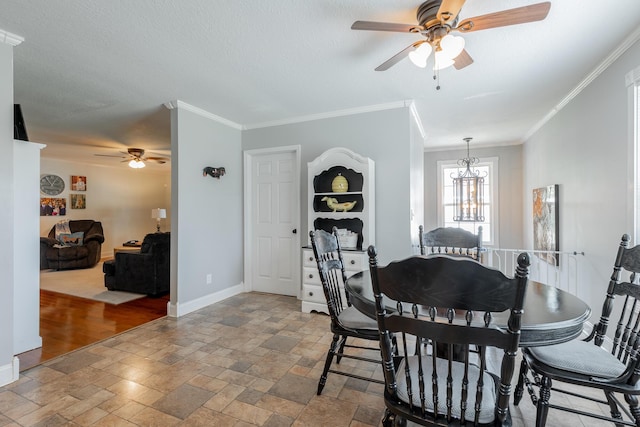 78 Gray Rd, Signal Mountain, TN 37377 - dining room with a ceiling fan, stone tile floors, ornamental molding, and a chandelier