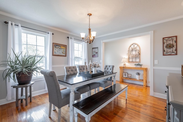 78 Gray Rd, Signal Mountain, TN 37377 - dining room featuring a chandelier, ornamental molding, and light wood-style floors