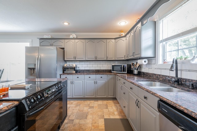 78 Gray Rd, Signal Mountain, TN 37377 - kitchen featuring stainless steel appliances, gray cabinetry, light stone finish flooring, decorative backsplash, and ornamental molding