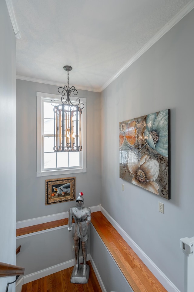 78 Gray Rd, Signal Mountain, TN 37377 - living area with wood finished floors, a chandelier, and ornamental molding