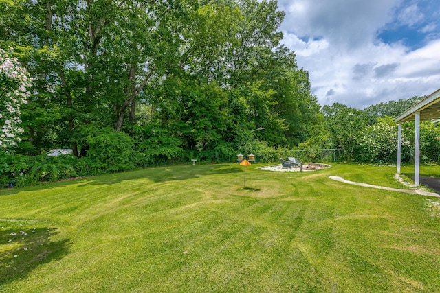 78 Gray Rd, Signal Mountain, TN 37377 - view of green lawn featuring an outdoor fire pit