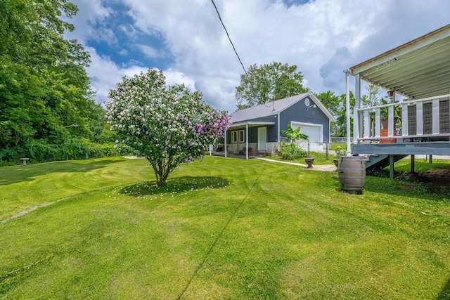 78 Gray Rd, Signal Mountain, TN 37377 - view of green lawn with a garage and a wooden deck