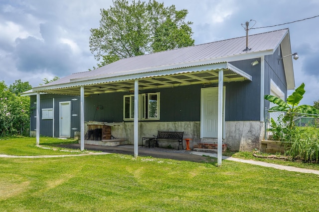 78 Gray Rd, Signal Mountain, TN 37377 - rear view of house featuring a metal roof and entry steps