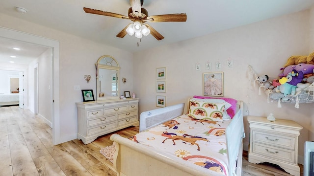 548 Buddy Rd, Burns, TN 37029 - bedroom featuring light wood finished floors and ceiling fan