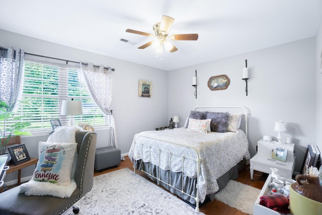 8202 Iris Rd, Chattanooga, TN 37421 - bedroom with wood finished floors and ceiling fan