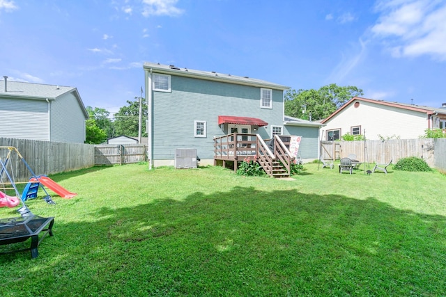 8202 Iris Rd, Chattanooga, TN 37421 - rear view of property with a fenced backyard and a wooden deck