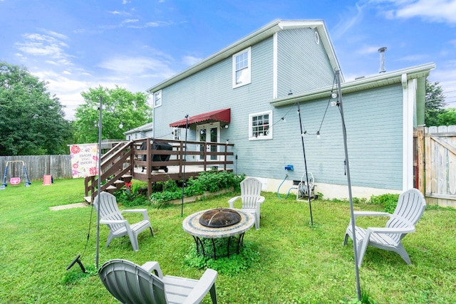 8202 Iris Rd, Chattanooga, TN 37421 - back of house with a fire pit and a wooden deck