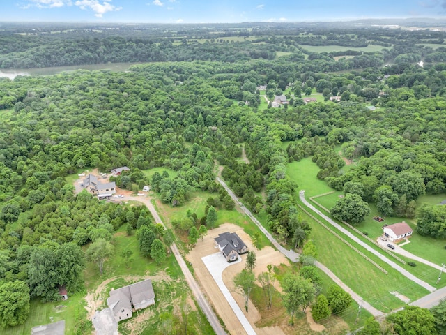 408 Harsh Ln, Castalian Springs, TN 37031 - aerial view of property and surrounding area featuring a heavily wooded area