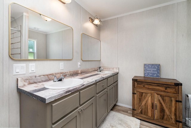 1640 Eno Rd, Dickson, TN 37055 - full bath featuring double vanity, ornamental molding, and wood finished floors