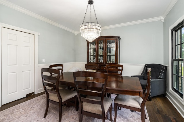 1640 Eno Rd, Dickson, TN 37055 - dining space featuring plenty of natural light, wood finished floors, crown molding, a chandelier, and wainscoting