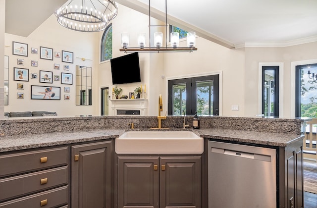1640 Eno Rd, Dickson, TN 37055 - kitchen with dishwasher, a chandelier, open floor plan, plenty of natural light, and crown molding