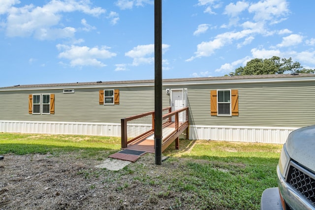 1640 Eno Rd, Dickson, TN 37055 - rear view of house featuring a lawn