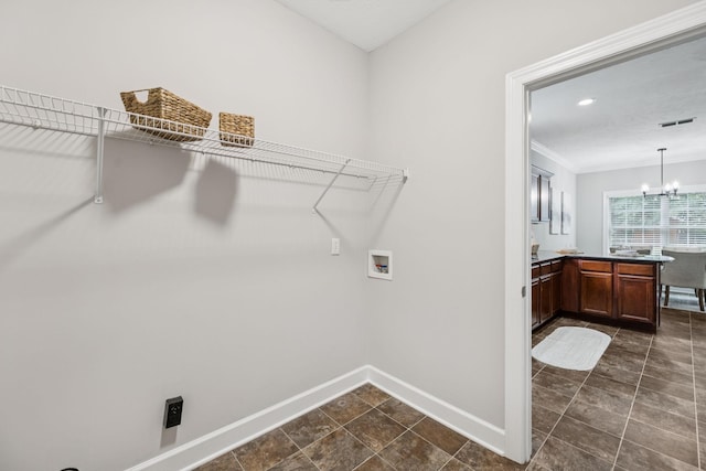 4613 Scottish Dr, Murfreesboro, TN 37128 - washroom with washer hookup, a chandelier, and ornamental molding