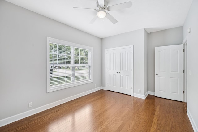 4613 Scottish Dr, Murfreesboro, TN 37128 - unfurnished bedroom with wood finished floors, a closet, and ceiling fan