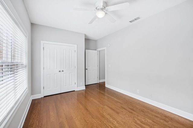4613 Scottish Dr, Murfreesboro, TN 37128 - unfurnished bedroom featuring wood finished floors, a closet, and ceiling fan