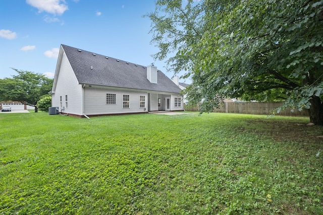 4613 Scottish Dr, Murfreesboro, TN 37128 - back of house featuring a chimney, a patio area, and a shingled roof
