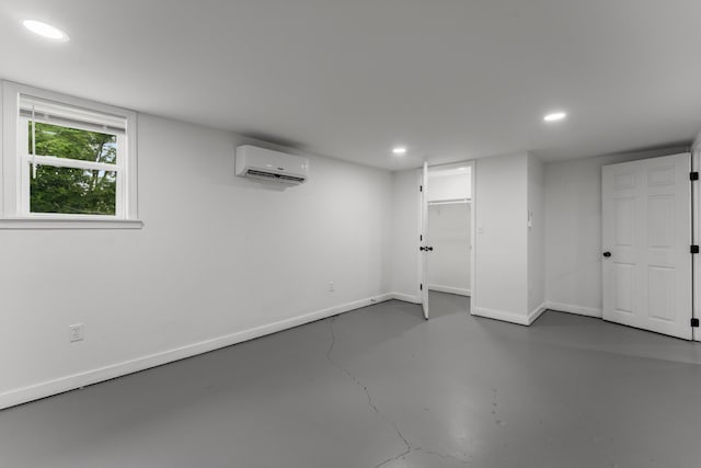 3211 Mayer Ln, Nashville, TN 37218 - below grade area featuring a wall mounted AC and recessed lighting