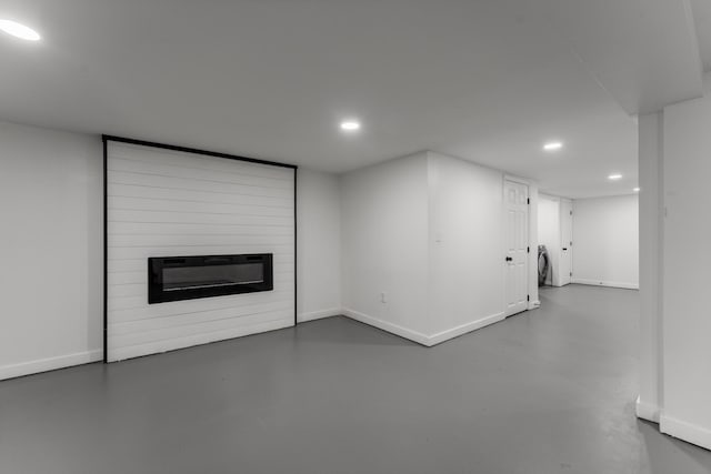 3211 Mayer Ln, Nashville, TN 37218 - unfurnished living room with recessed lighting, finished concrete floors, and a large fireplace