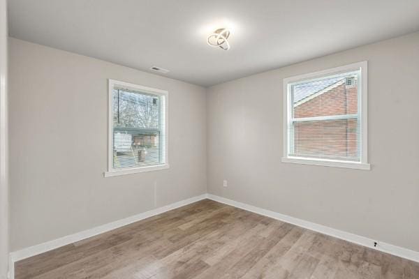 3211 Mayer Ln, Nashville, TN 37218 - spare room with light wood-style floors and baseboards