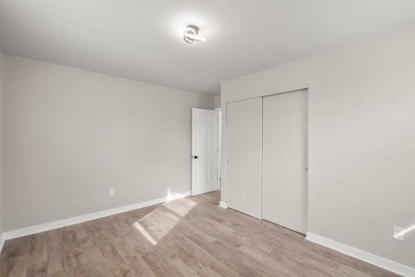 3211 Mayer Ln, Nashville, TN 37218 - unfurnished bedroom with wood finished floors and a closet