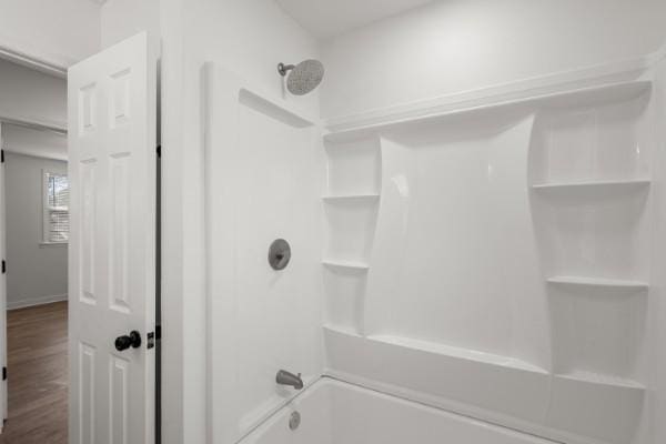 3211 Mayer Ln, Nashville, TN 37218 - bathroom featuring shower / tub combination and wood finished floors