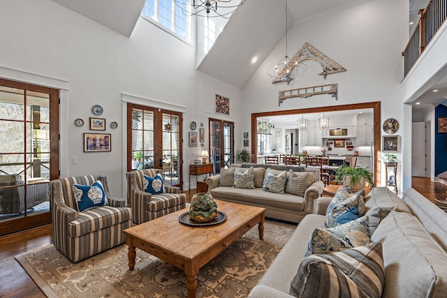 1049 Holly Tree Gap Rd, Brentwood, TN 37027 - living area featuring a chandelier, high vaulted ceiling, and healthy amount of natural light