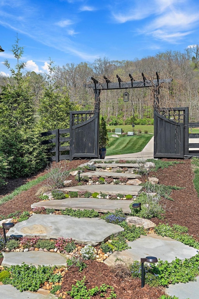 1049 Holly Tree Gap Rd, Brentwood, TN 37027 - view of yard with a gate and a vegetable garden