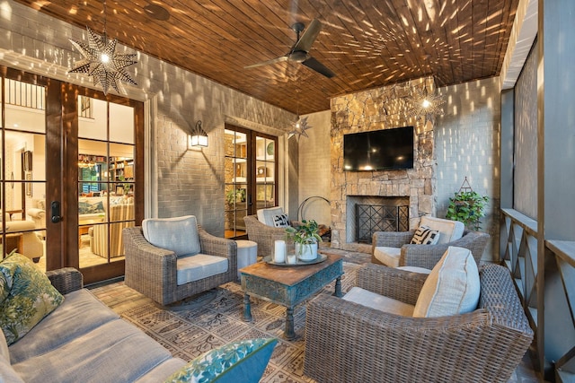 1049 Holly Tree Gap Rd, Brentwood, TN 37027 - view of patio / terrace with a ceiling fan, an outdoor living space with a fireplace, and french doors