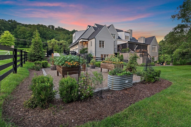 1049 Holly Tree Gap Rd, Brentwood, TN 37027 - back of house featuring a vegetable garden