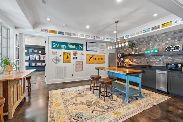 1049 Holly Tree Gap Rd, Brentwood, TN 37027 - indoor wet bar with finished concrete flooring and recessed lighting