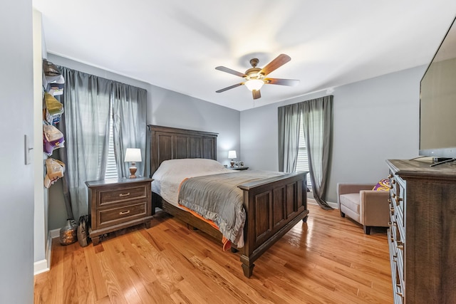 216 Desperado Ave, Pulaski, TN 38478 - bedroom with multiple windows, light wood-style floors, and a ceiling fan