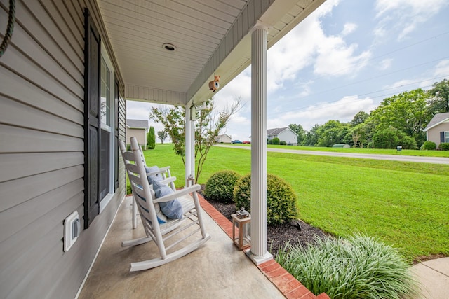 216 Desperado Ave, Pulaski, TN 38478 - covered porch featuring a yard