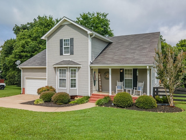 216 Desperado Ave, Pulaski, TN 38478 - view of front of property featuring a porch, a front lawn, roof with shingles, driveway, and an attached garage