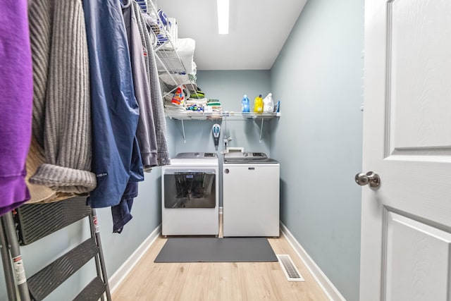 216 Desperado Ave, Pulaski, TN 38478 - washroom with washer and clothes dryer and light wood-style flooring