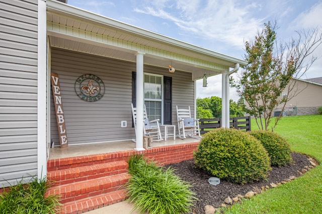 216 Desperado Ave, Pulaski, TN 38478 - doorway to property with covered porch and a lawn
