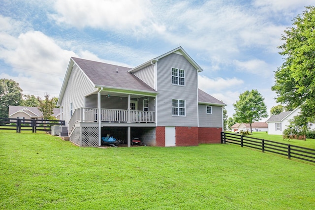 216 Desperado Ave, Pulaski, TN 38478 - back of house featuring a fenced backyard, a wooden deck, and roof with shingles