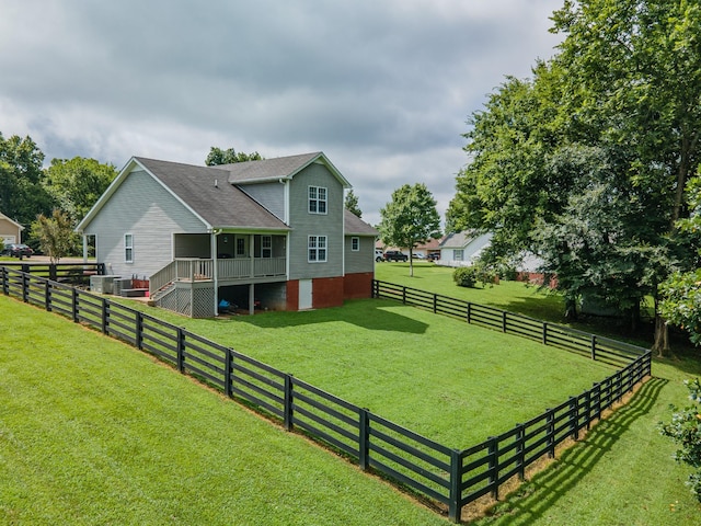 216 Desperado Ave, Pulaski, TN 38478 - back of house with a wooden deck, a fenced backyard, roof with shingles, and stairway