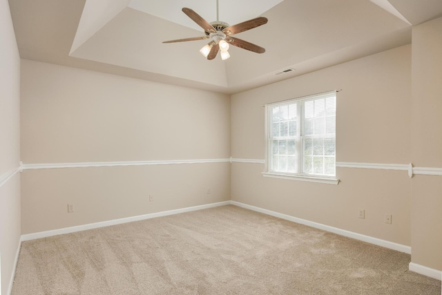 140 Janes Way NE, Cleveland, TN 37323 - spare room featuring carpet flooring, a ceiling fan, and a raised ceiling