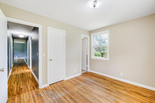 201 Sterry Ct, Antioch, TN 37013 - unfurnished bedroom featuring hardwood / wood-style flooring and a closet