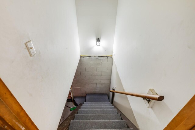 201 Sterry Ct, Antioch, TN 37013 - staircase featuring concrete block wall
